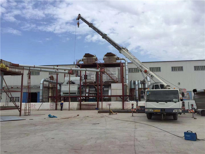 定安县“手脚齐动”—— 吊车的 “协同作业” 技术